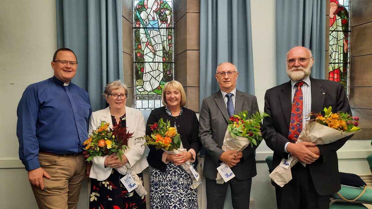 Rev Grant Maclaughlan left with four new elders, all carrying flowers